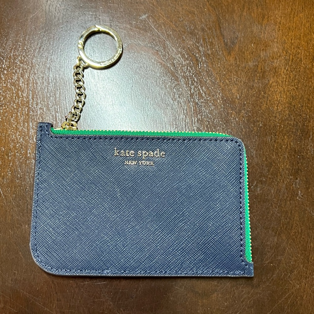 Kate Spade zip cardholder / small wallet with keychain attachment.